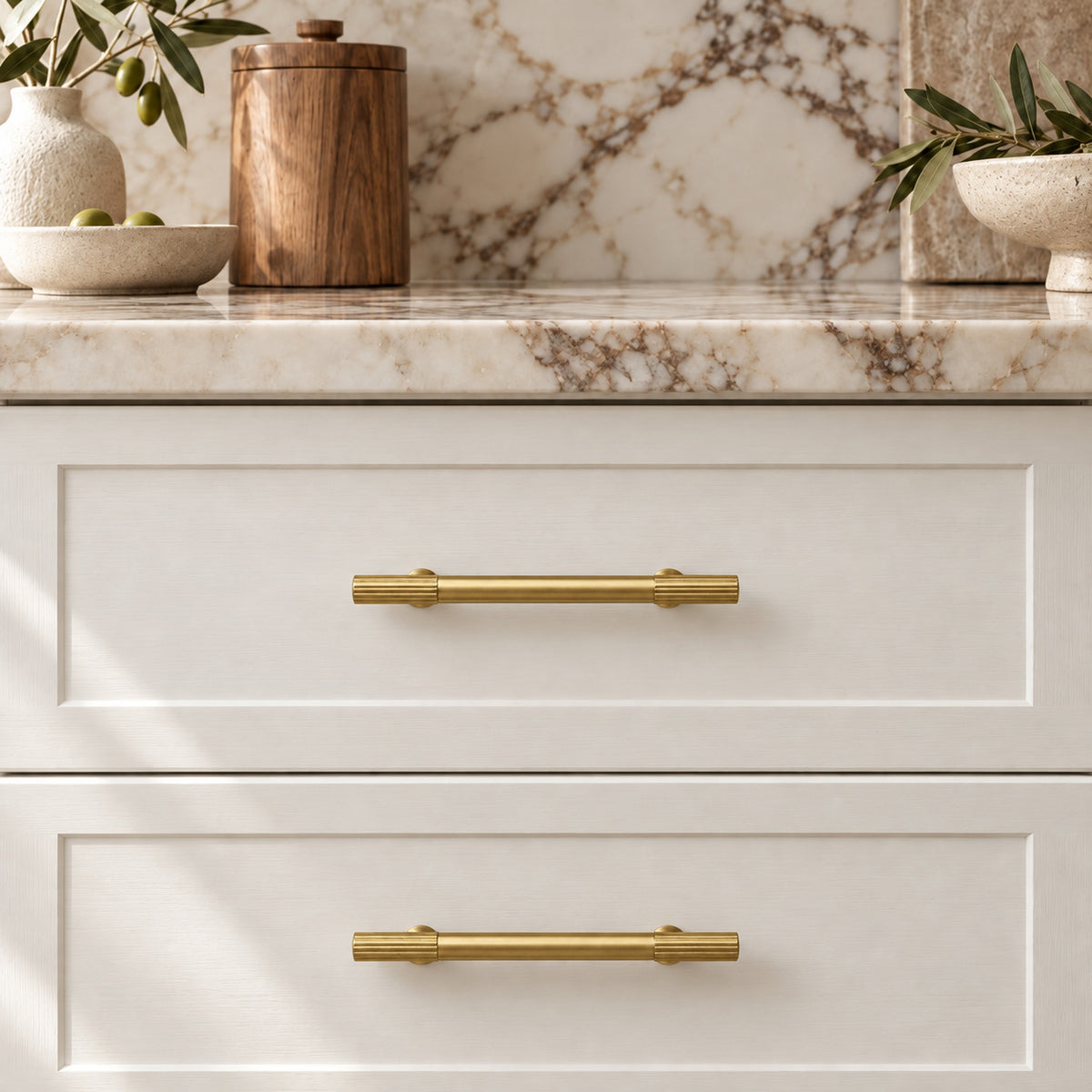 PLEAT Fluted Cabinet Pull in Natural Brass — shown on cabinetry