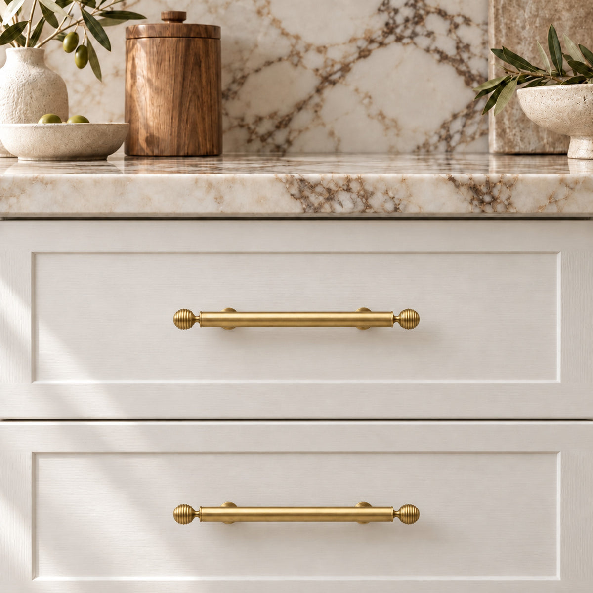 REEL Ringed-End Cabinet Pull in Natural Brass — shown on cabinetry