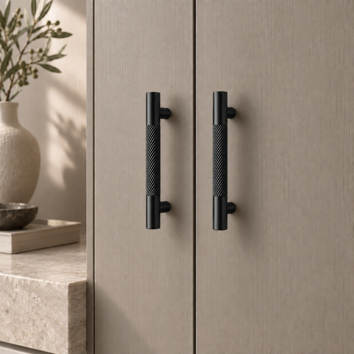 TRACE Knurled Cabinet Pull in Matte Black — shown on cabinetry